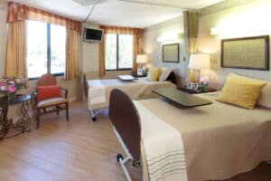 A shared room for residents with a TV at Vasona Creek