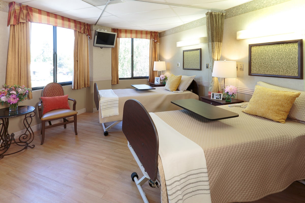 A shared room for residents with a TV at Vasona Creek