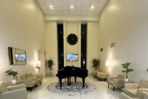 A common room with a piano at Vasona Creek